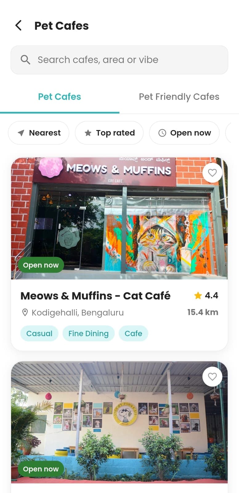 Pet cafes listing with ratings and distance