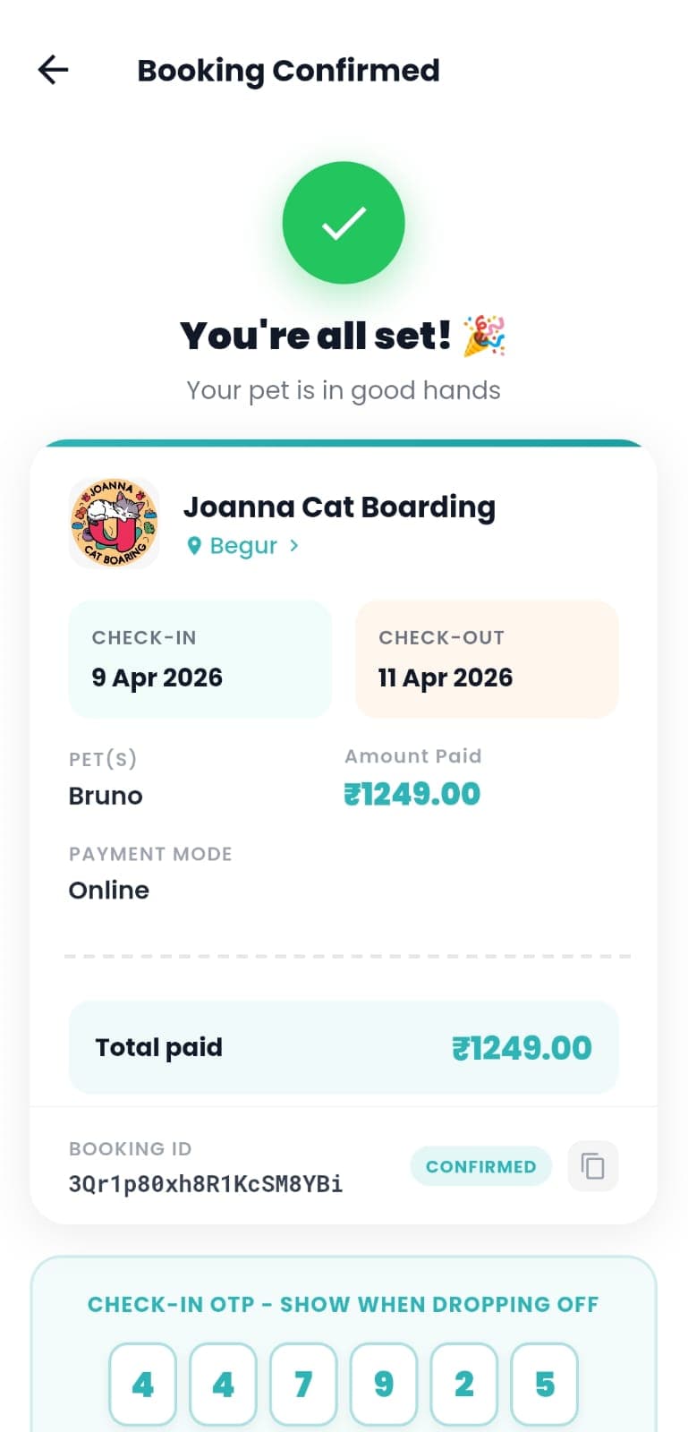 Booking confirmed screen with payment details and check-in OTP